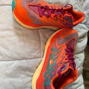 Hoka Orange and Teal Athletic Shoes